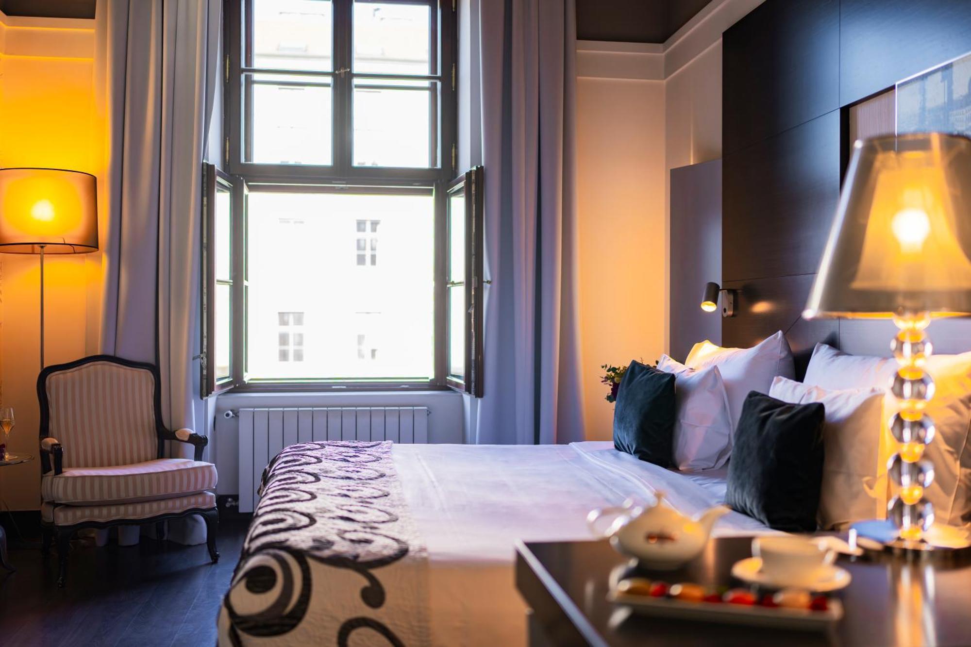 Grand Palace Brno Ruang foto A room at the Hotel Axelmannstein